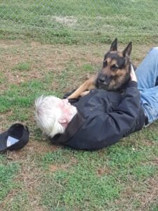 Hachi showing love to The Dogman.